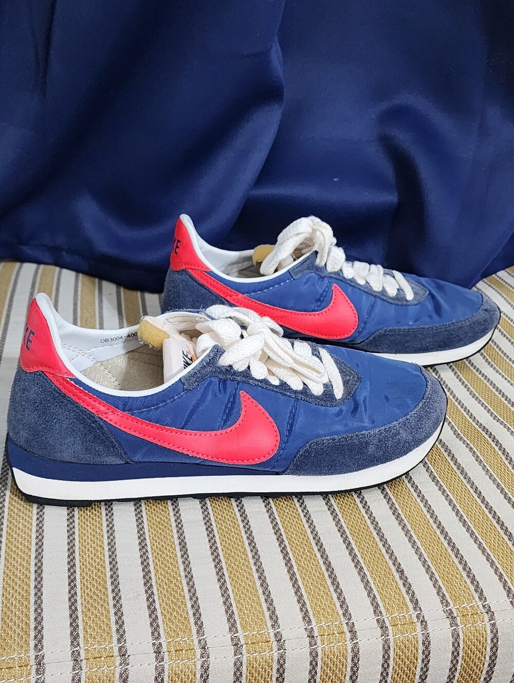 Nike Men’s Navy Blue Sneakers with Bright Red Swoosh